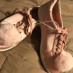Pink satin sneakers with pink pom poms